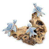 3 Swimming Turtles on Coral