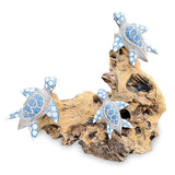 3 Swimming Turtles on Coral